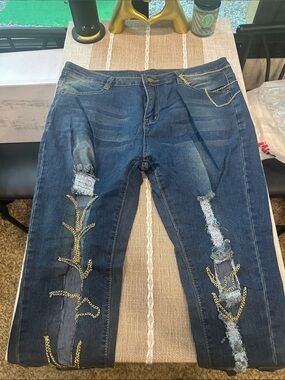 Dark Wash Distressed Women’s Jeans with Chain Embellishment
